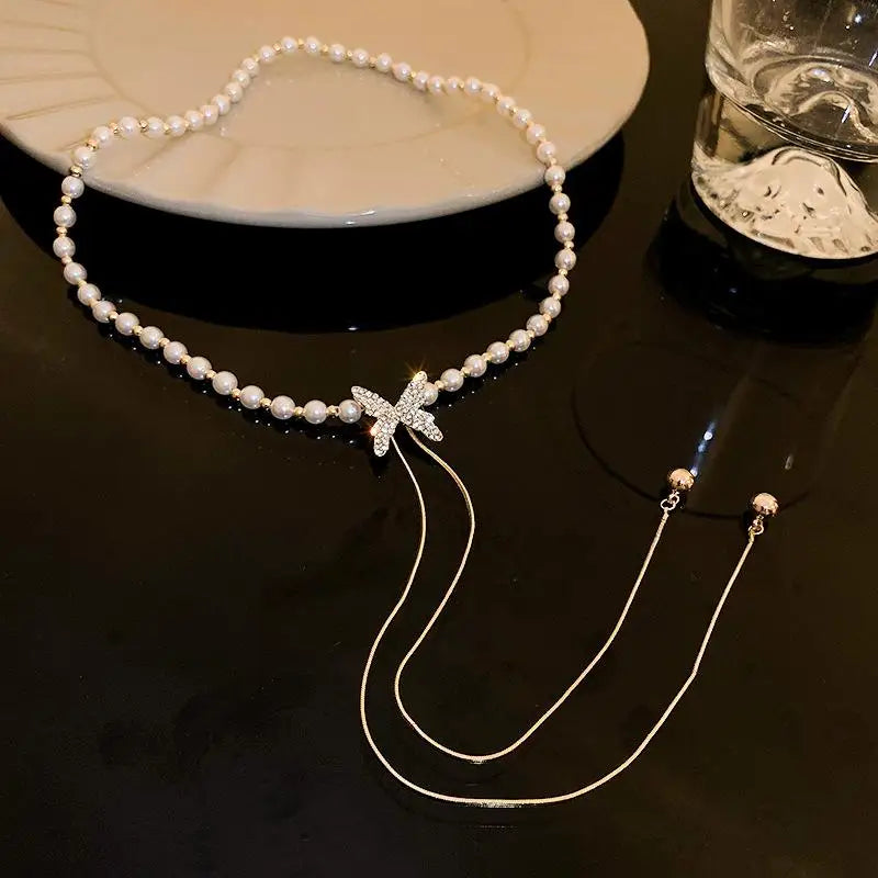 Elevate Your Style with the Fashion-Forward Adjustable Tassel Pearl Chain Necklace - Stunning Rhinestone Butterfly Design Perfect for Weddings and Birthdays
