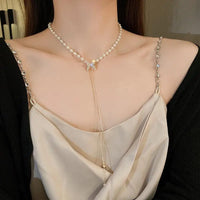 Elevate Your Style with the Fashion-Forward Adjustable Tassel Pearl Chain Necklace - Stunning Rhinestone Butterfly Design Perfect for Weddings and Birthdays